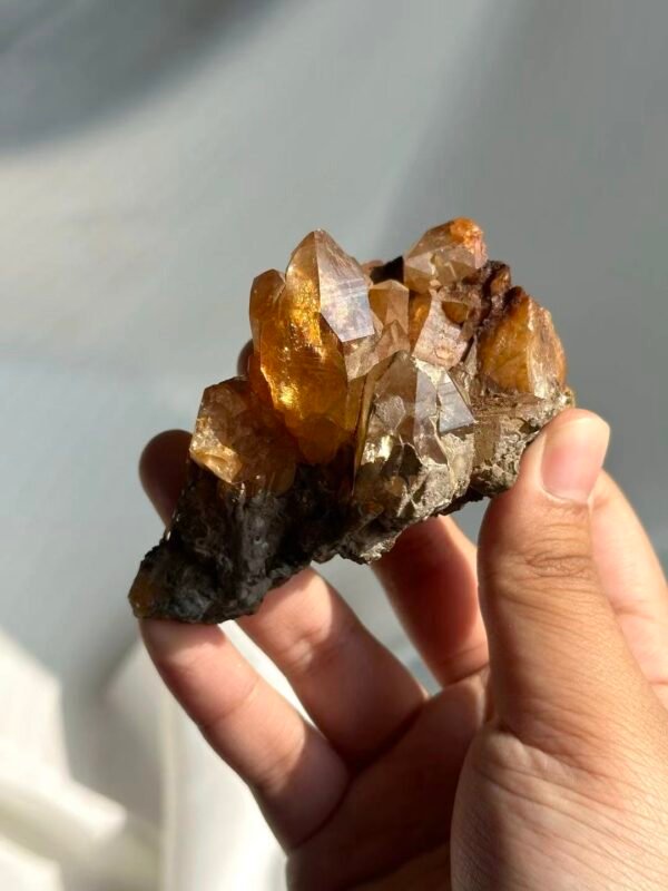 Rose Manor Floating Brownish-Red Himalayan Crystal Cluster  15B