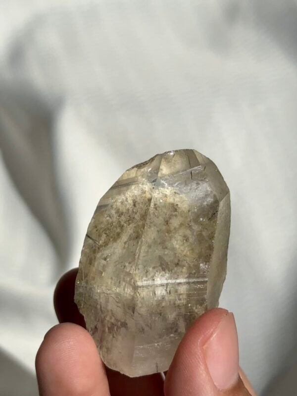 Transparent Himalayan crystal with white ghost and rutine interior  11C