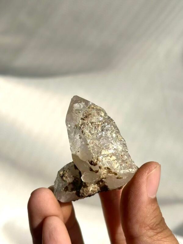 Transparent White Himalayan Crystal with Golden-Red Rutile Inclusions  14N